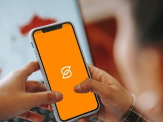 Pictured shows a silhouette of a person opening the safeboda app. FILE PHOTO/COURTESY PHOTO