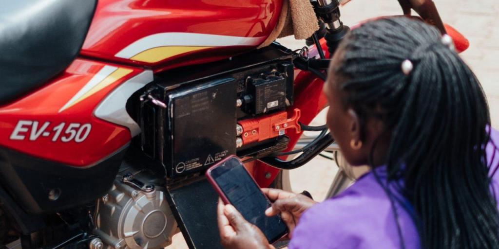 A GOGO Electric agent scanning a battery at a swap station. COURTESY PHOTO