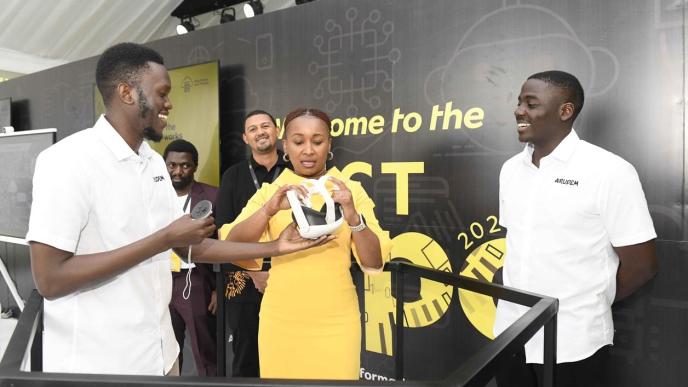 MTN Chief Executive Officer, Sylvia Mulinge trying the VR Experience powered by 5G at the MTN ICT Expo held in Kampala in August. Courtesy Photo