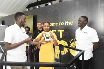 MTN Chief Executive Officer, Sylvia Mulinge trying the VR Experience powered by 5G at the MTN ICT Expo held in Kampala in August. Courtesy Photo