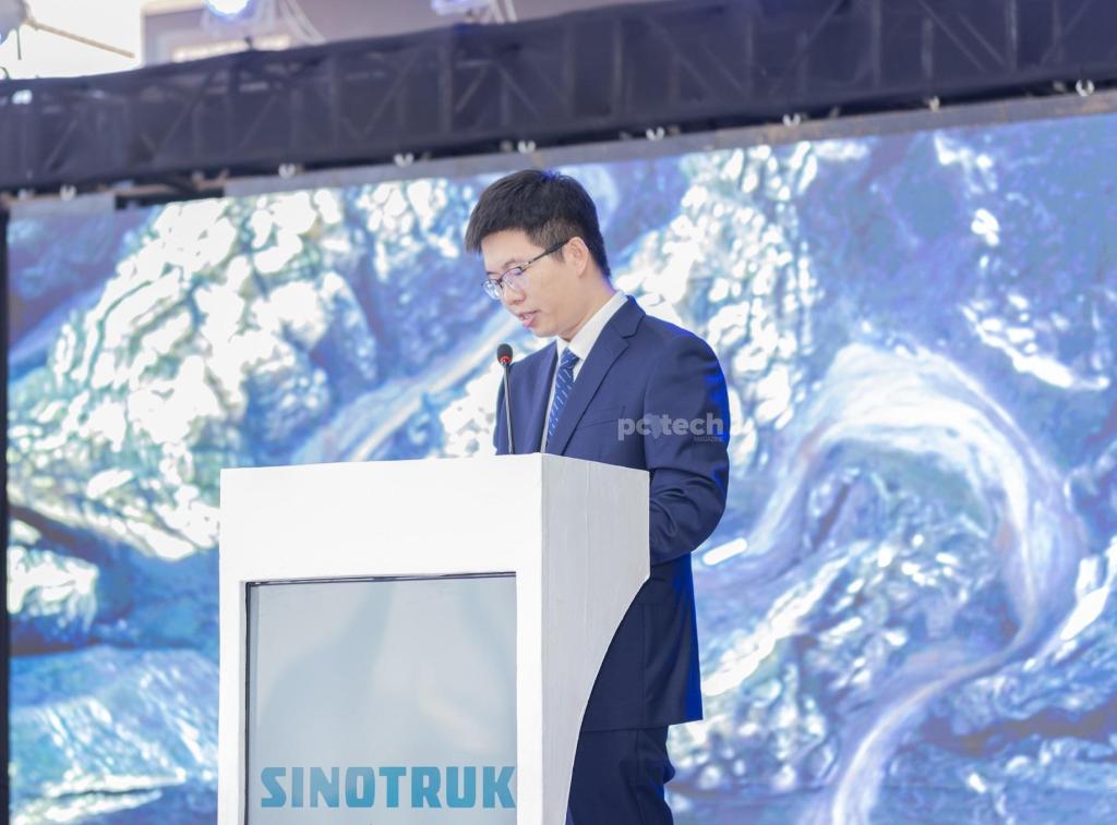 Tang Wenjum, Country Manager of Sino Truck International Group in Uganda speaking at the launch of new Sino truck models in Uganda at Double Q head offices in Busega. PHOTO: PC Tech Magazine