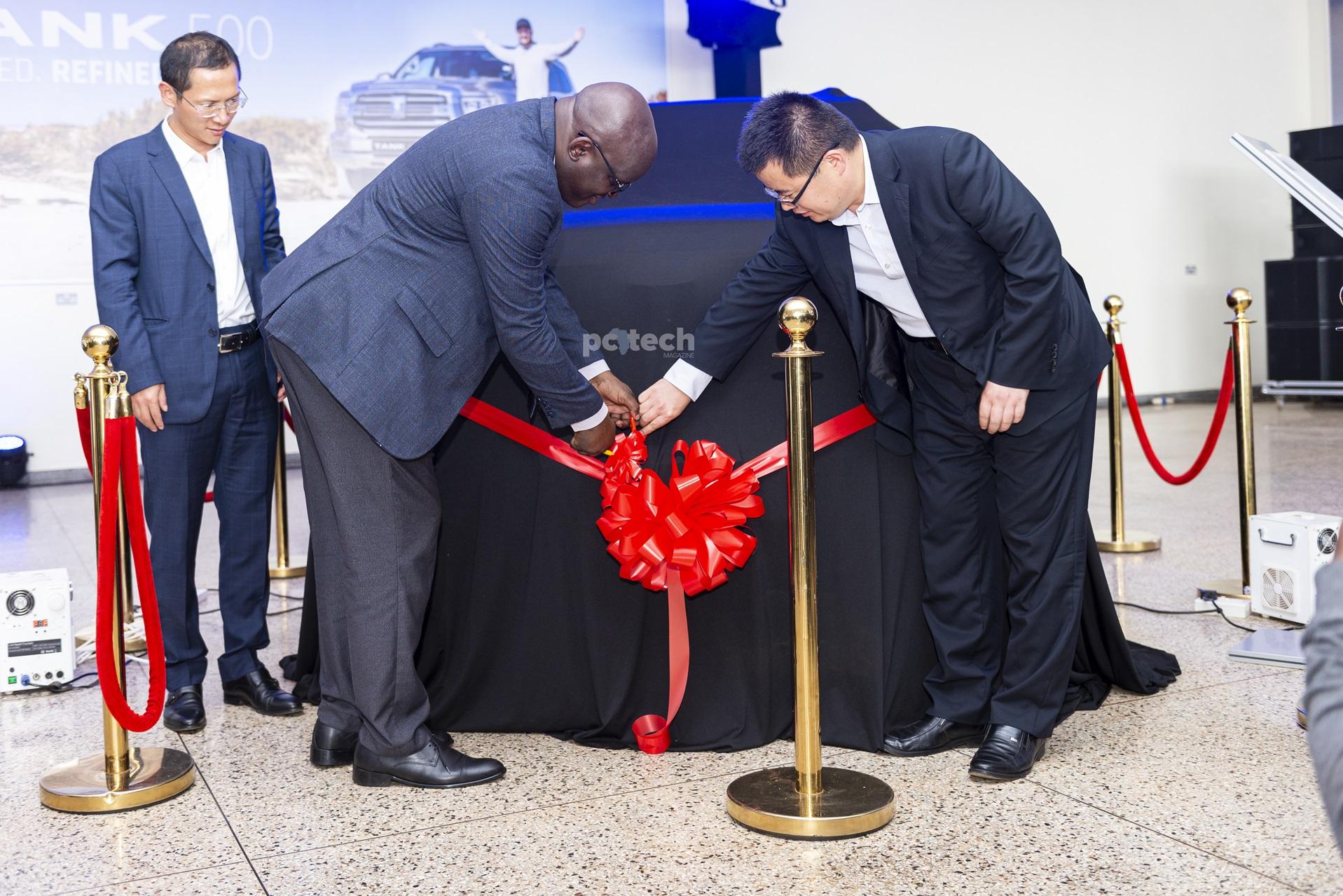 Eng. Dr. Timothy Tibesigwa and a global representative from GWM unveiling Tank 500 flagship SUV in Uganda while Double Q Managing Director; Bruce Lin looks on. PHOTO: PC Tech Magazine