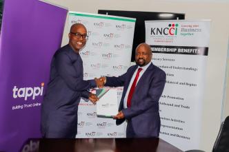 Kenfield Griffith (left); Founder and CEO of tappi and Dr. James Mwaura (right); Chairman of KNCCI Nairobi County shake hands after signing an MoU that will enable tappi to deliver digital services to KNCCI’s business members. COURTESY PHOTO