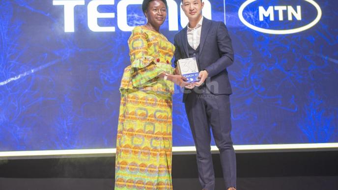 Rosemary Seninde Nansubuga (left) and Tecno Brand Manager, Timmy Shen display one of the Tecno Camon 30 smartphones after launching the series at the event held at the Kampala Serena Hotel. PHOTO: PC Tech Magazine