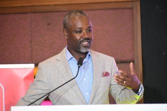 Deputy Speaker of Parliament, Rt. Hon. Thomas Tayebwa speaking at the first data analytics, artificial intelligence, and data governance symposium at the Kampala Sheraton Hotel. COURTESY PHOTO/ via Thomas Tayebwa on X