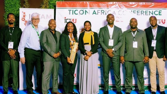 Rowena Turinawe (4th from left) poses for a group photo with the Ps. Ministry of ICT and National Guidance, Dr. Aminah Zawedde (4th from right) and representatives of TICON Africa after winning the ICT Young Professional of the Year awards. PHOTO: TICON Africa