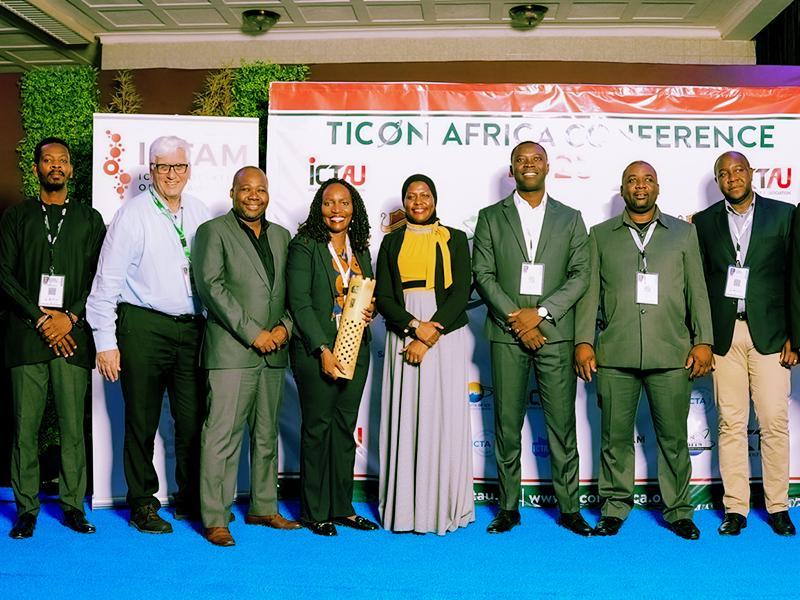 Rowena Turinawe (4th from left) poses for a group photo with the Ps. Ministry of ICT and National Guidance, Dr. Aminah Zawedde (4th from right) and representatives of TICON Africa after winning the ICT Young Professional of the Year awards. PHOTO: TICON Africa