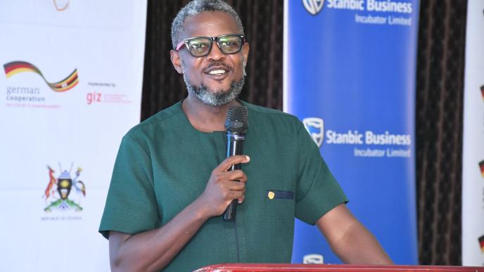 Tony Otoa, CEO of Stanbic Business Incubator speaking at the at Stanbic Business Incubator graduation ceremony held at Hotel Africana.