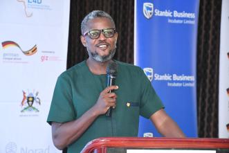 Tony Otoa, CEO of Stanbic Business Incubator speaking at the at Stanbic Business Incubator graduation ceremony held at Hotel Africana.