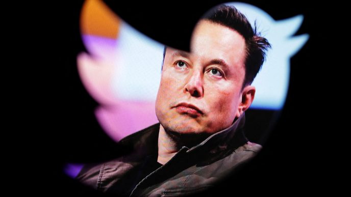 FILE PHOTO: Elon Musk's photo is seen through a Twitter logo in this illustration taken October 28, 2022. REUTERS/Dado Ruvic/Illustration