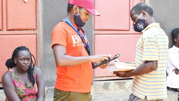 An enumerator (in hat) during the 2024 Uganda Census. PHOTO: UBOS