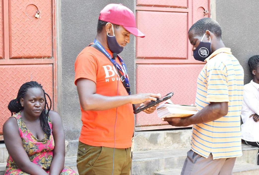 An enumerator (in hat) during the 2024 Uganda Census. PHOTO: UBOS