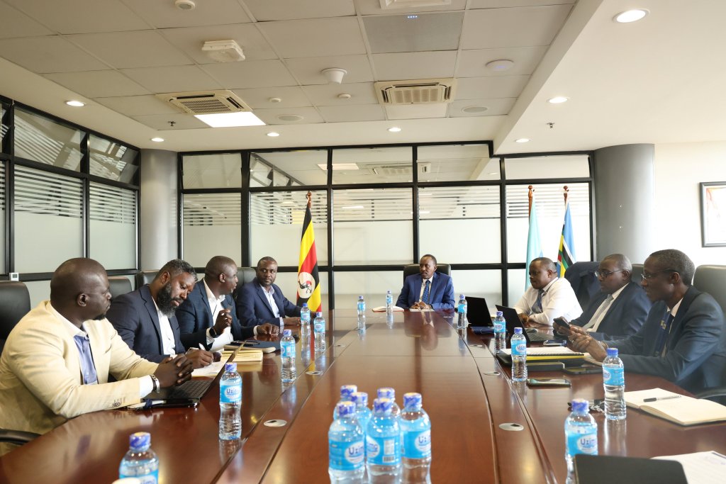 URA Commissioner Gen. John Rujoki Musinguzi (center) in a meeting with a team from Global Voice Group (GVG) led by its CEO James G. Claude to strategize ways of addressing compliance gaps in the telecom sector and data-dependent companies. Courtesy Photo