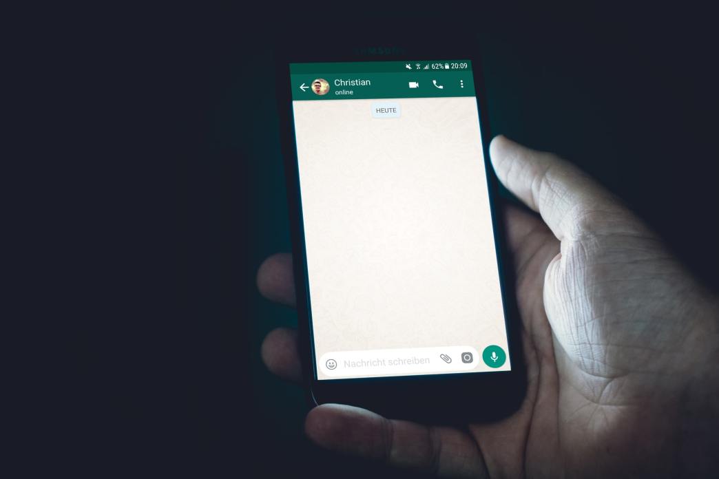 A user displaying a new default WhatsApp chat. (PHOTO: Christian Wiediger/Unsplash)