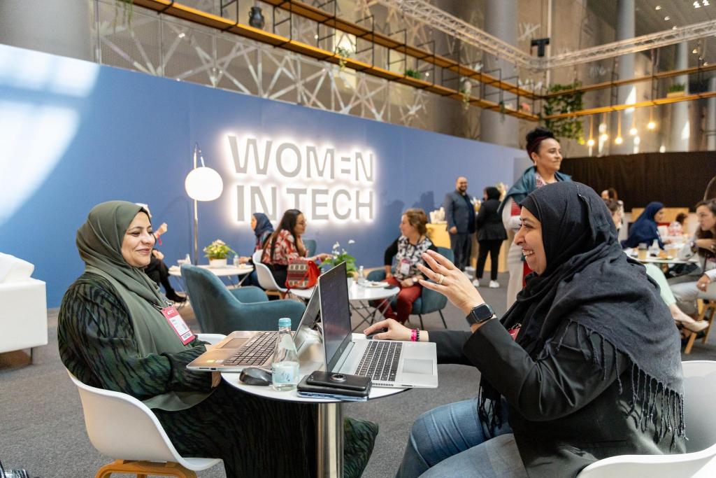 Two women pictured in a women in tech only section at the 2024 Web Summit Qatar. PHOTO: Web Summit